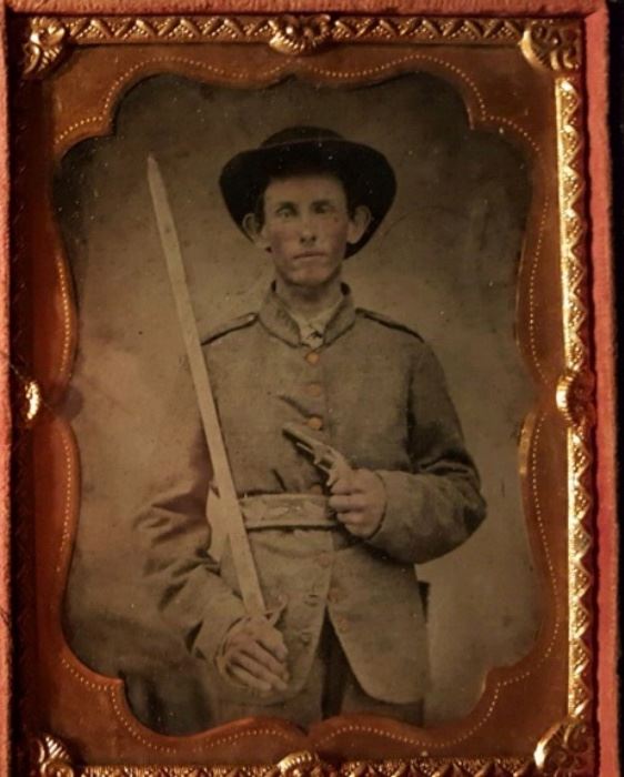 Armed Confederate soldier ambrotype photo