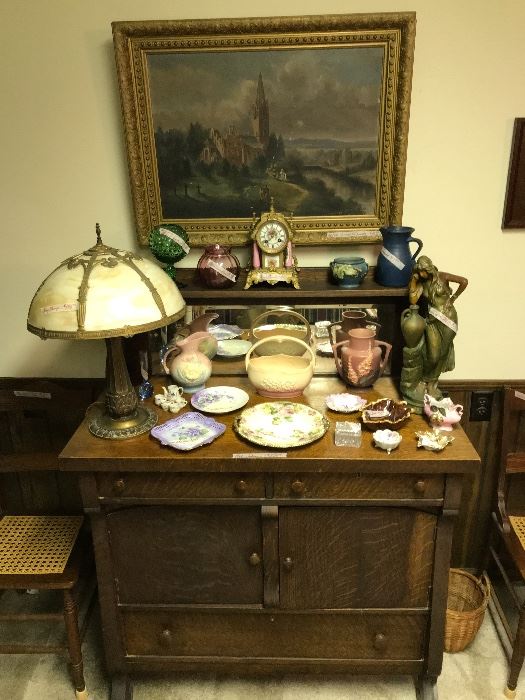 Oak buffet, slag glass lamp, Roseville & Hull pottery