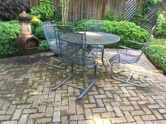 Five piece mess metal patio table and chairs