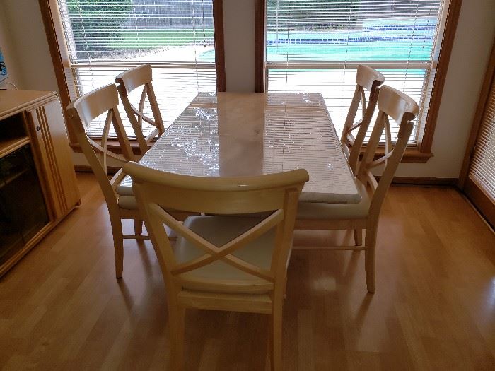 Marble dining table
5 Bassett chairs- handcrafted solid Oak frames