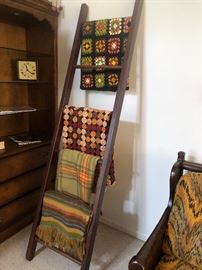 Arts and Crafts Display Ladder, Handmade Quits and Aphgans, amazing book cases, amazing curios