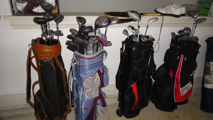Golf clubs, 4 sets of irons, 1 women’s set of “Hope” golf clubs 