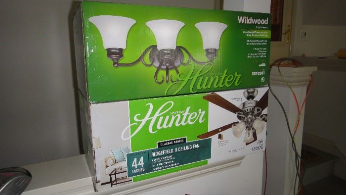 New in box, light fixtures, ceiling fans 