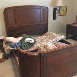 Antique full bed with curved footboard and nice caning
