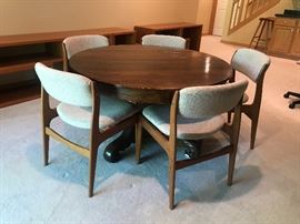 Antique Oak Round Pedestal Table.   5 Mid Century Teak Chairs