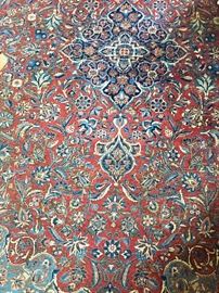 Antique Persian rug. Room size.