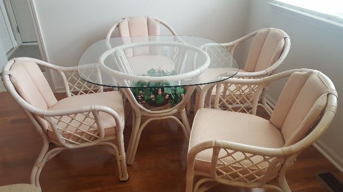 $120   Round glass table with four chairs   measures 39" round