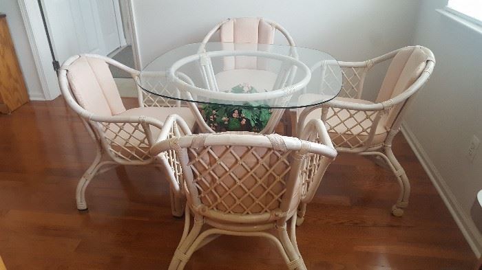 $120   Glass table top with four coaster chairs