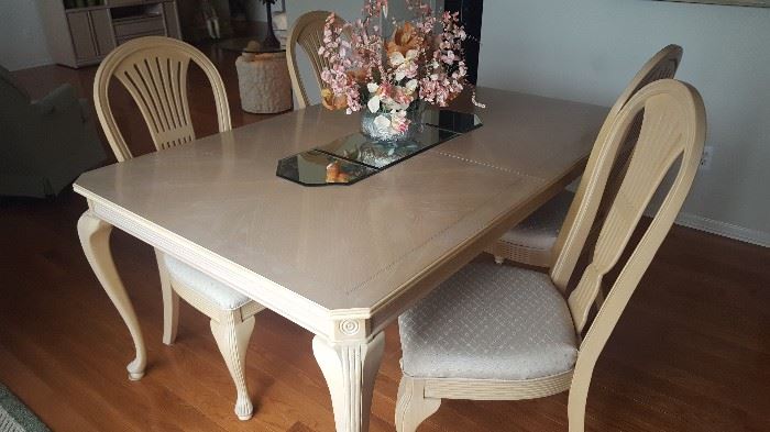 $225  Light wood table with 6 chairs and extra leaves