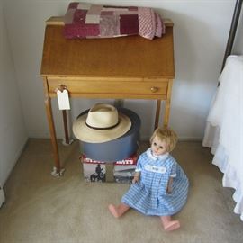 Ladies' birds-eye maple writing desk, vintage hats, old doll