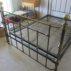 Foot of brass bed
