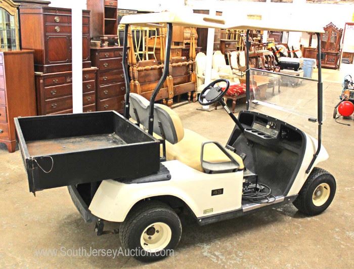  EZ Go 36 Volt Golf Cart with Utility Bed and Charger in Running Condition

Located Inside – Auction Estimate $1000-$3000 