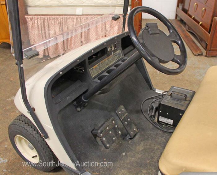  EZ Go 36 Volt Golf Cart with Utility Bed and Charger in Running Condition

Located Inside – Auction Estimate $1000-$3000 