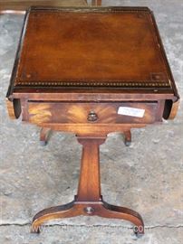 Burl Mahogany Leather Top Drop Side Table
Located Inside – Auction Estimate $50-$100
