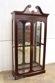 Mahogany Chippendale Style Mirror Back Display Cabinet with Inlay by “Jasper Cabinet Company”
Located Inside – Auction Estimate $100-$300

