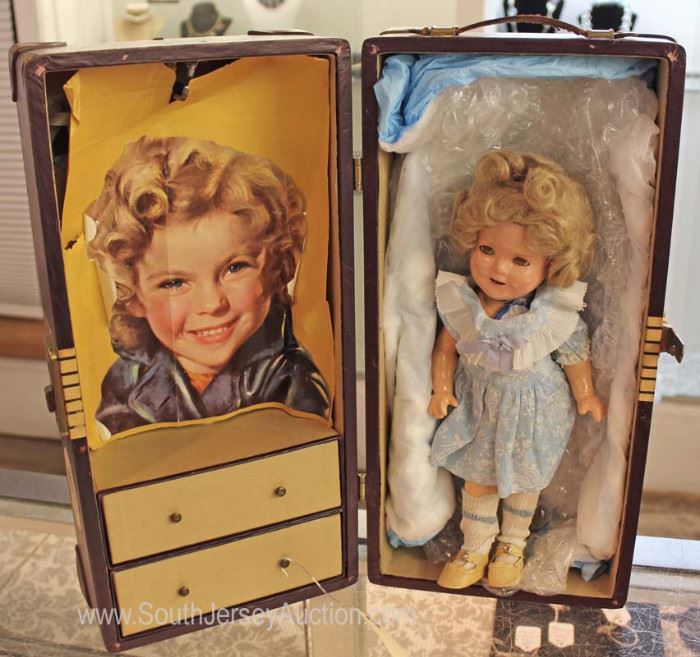 VINTAGE Composition Shirley Temple Doll in Case with Clothes
Located Inside – Auction Estimate $50-$100
