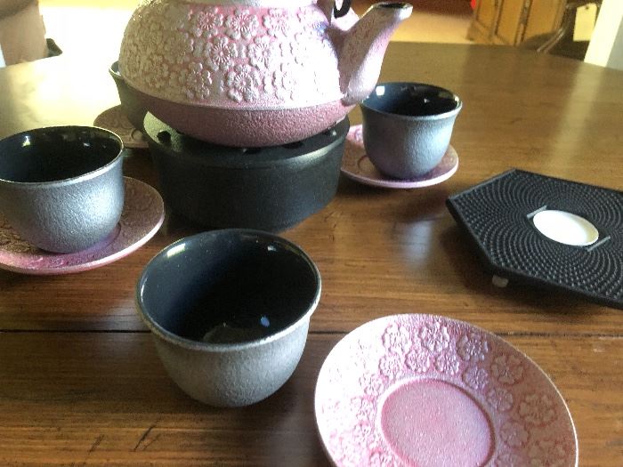 Teavana Cast iron tea pot with 4 cups and saucers. NIB