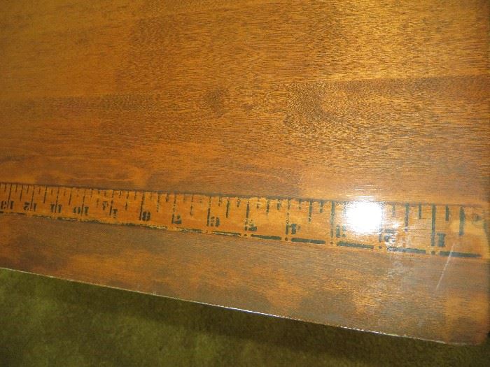 ANTIQUE FOLDING MAPLE SEWING TABLE
TAPE MEASURE MARKED INTO THE WOOD
(detail)