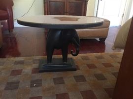 Glass top elephant table