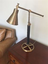 One of a pair of cool brass adjustable lamps