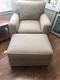 Khaki colored canvas arm chair and ottoman