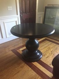 Black pedestal table