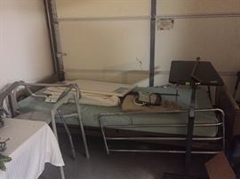 Hospital bed,  Bedside commode, bed bar, 2 walkers, over the bed table and cane