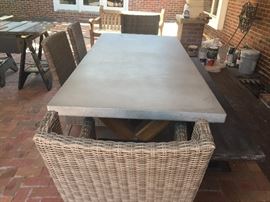 Concrete topped table with 2 arm chairs, 2 side chairs and a bench! Very nice!