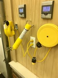 Wall mount extension cord and wall mount light on cord