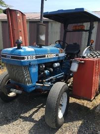3910 Ford tractor with side flail mower