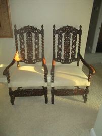 Pair of Highly carved arm chairs, antique and an excellent condition