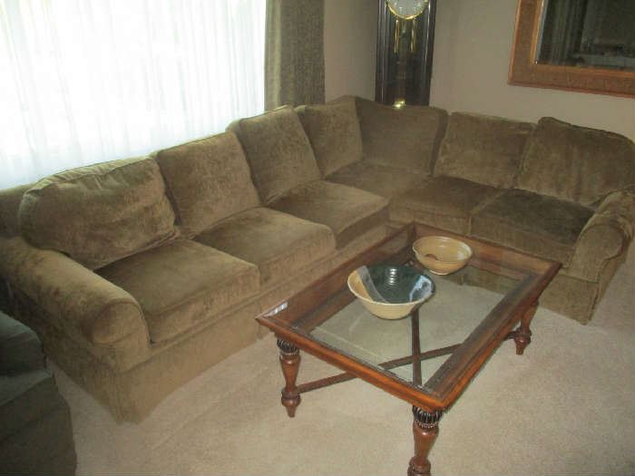 Sectional sofa with hide-a-bed, glass top coffee table