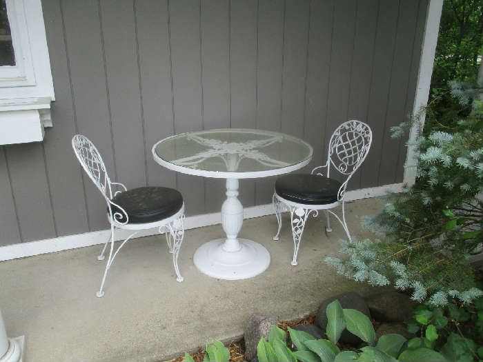 Woodard patio set, table and four chairs