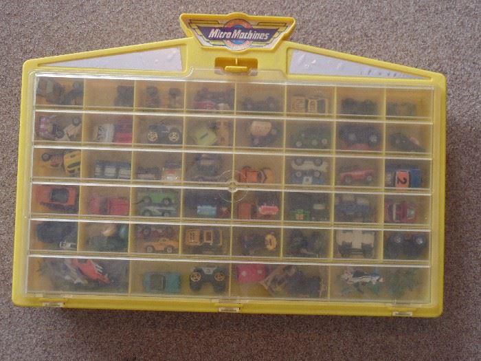 Approx  100 Micro Machines - mini cars with case
