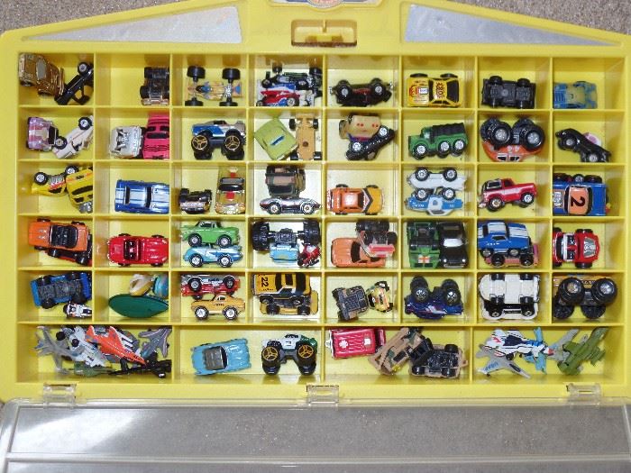 Approx  100 Micro Machines - mini cars with case