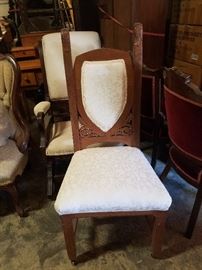 Oak carved chair with reupholstered seat and back
