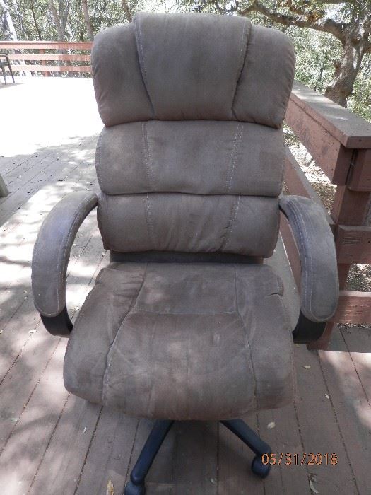 Nice gas filled reclining office chair with that "Tough as Nails" upholstery. 