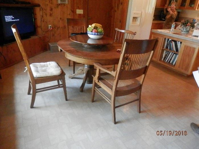 A photo of the oak country style table and arts and crafts chairs together