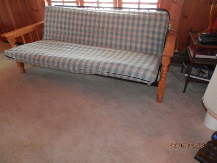 Large Queen Steel Frame Futon with Simmons Mattress and washable zipper cover and another zipper canvas mattress cover....Queen size I think