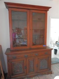 Solid Walnut display hutch,  glass is original "floated" and doors are carved.....also a find!!!