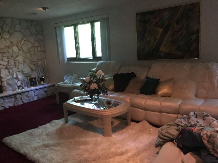 Painted glass top coffee table,  painted glass top end table, floral vase, wall art, and decorative pillows on the Stratford large 7 piece sectional sofa!