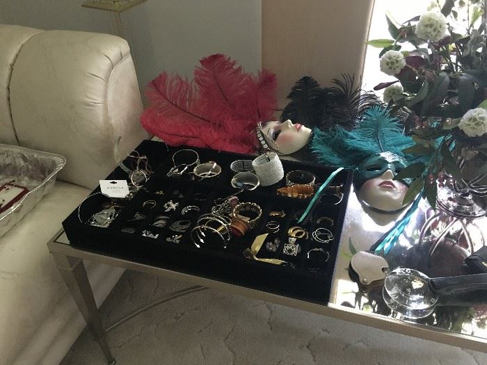 Costume jewelry, floral vase, and feather face masks!