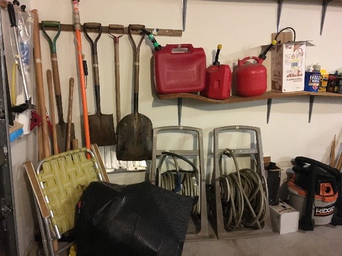 Garage garden tools, hoses and indoor outdoor vac!