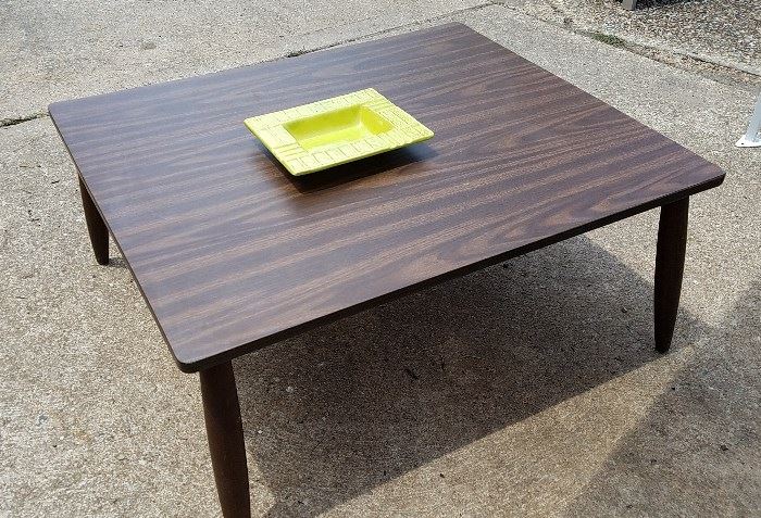 MCM coffee table. One of many vintage ashtrays
