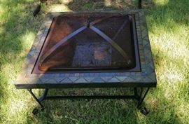 Backyard fire pit with screen and accessories