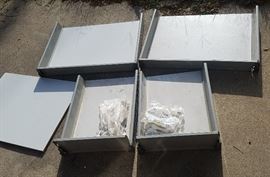 Assortment of (discontinued) Ikea cabinet drawers, including hardware and drawer rails.