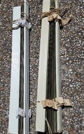 An example of some of the MANY vintage blinds...both metal and wood. All have cloth tapes - very 50's!