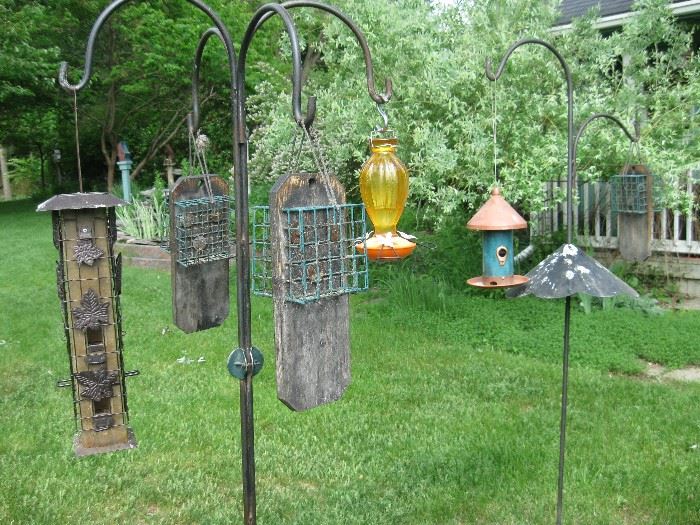 assortment of bird feeders