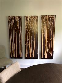 Triple wood carved panels depicting forest