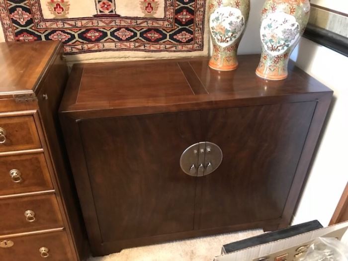 Oriental mahogany cabinet with three drawers inside and a shelve